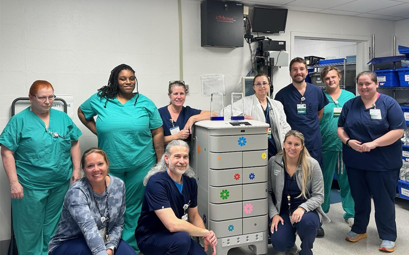 group photo of St. Elizabeth - Fort Thomas Hospital with robot
