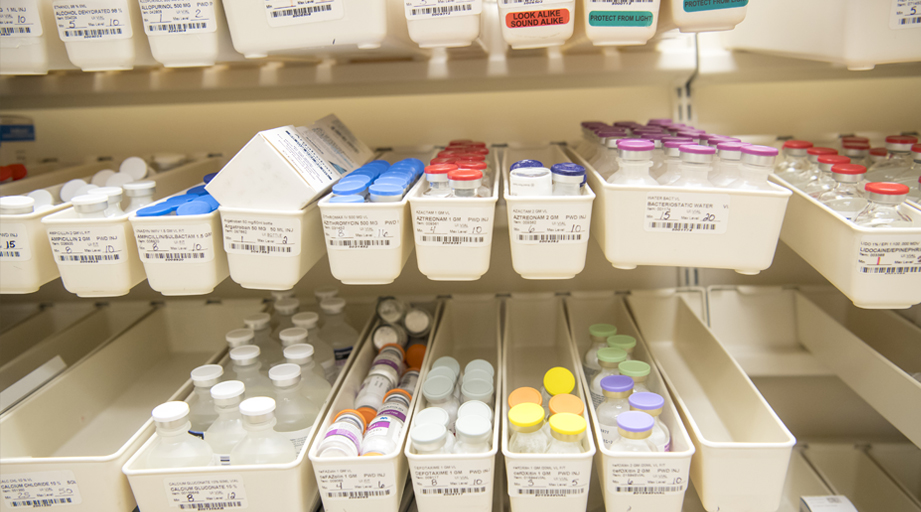 wall with containers holding medications