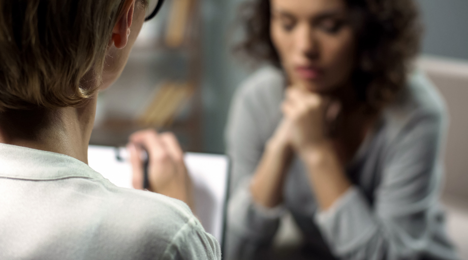 woman talking to lady healthcare provider during session