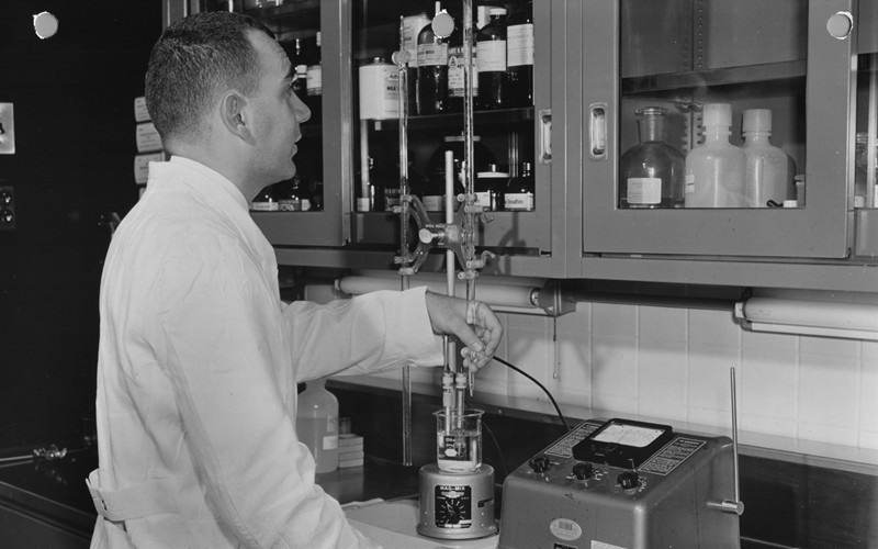 Joseph F. Gallelli titrates a solution at the Clinical Center pharmacy (1963)