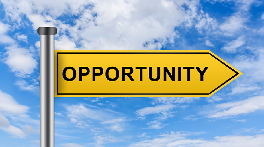 yellow road sign with the word opportunity on it