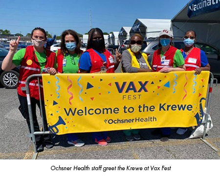 Ochsner Health staff greet the Krewe at Vax Fest