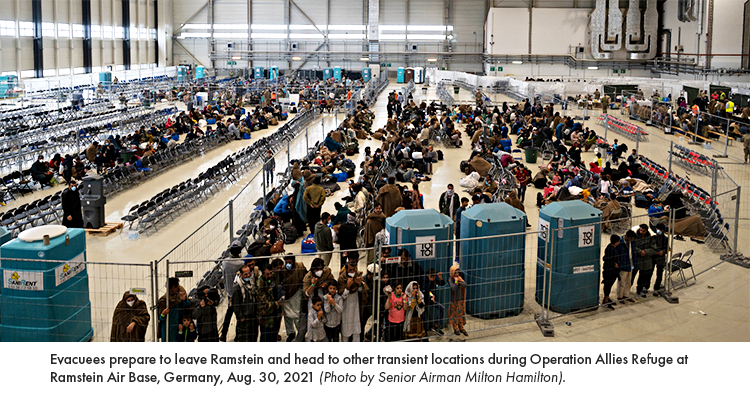 Evacuees prepare to leave Ramstein and head to other transient locations during Operation Allies Refuge at Ramstein Air Base, Germany, Aug. 30, 2021 (Photo by Senior Airman Milton Hamilton).